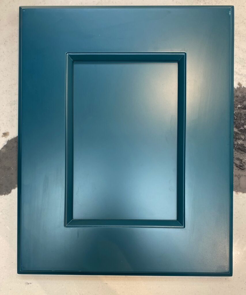 Windsor mitered-frame cabinet door with decorative inner molding, painted finish